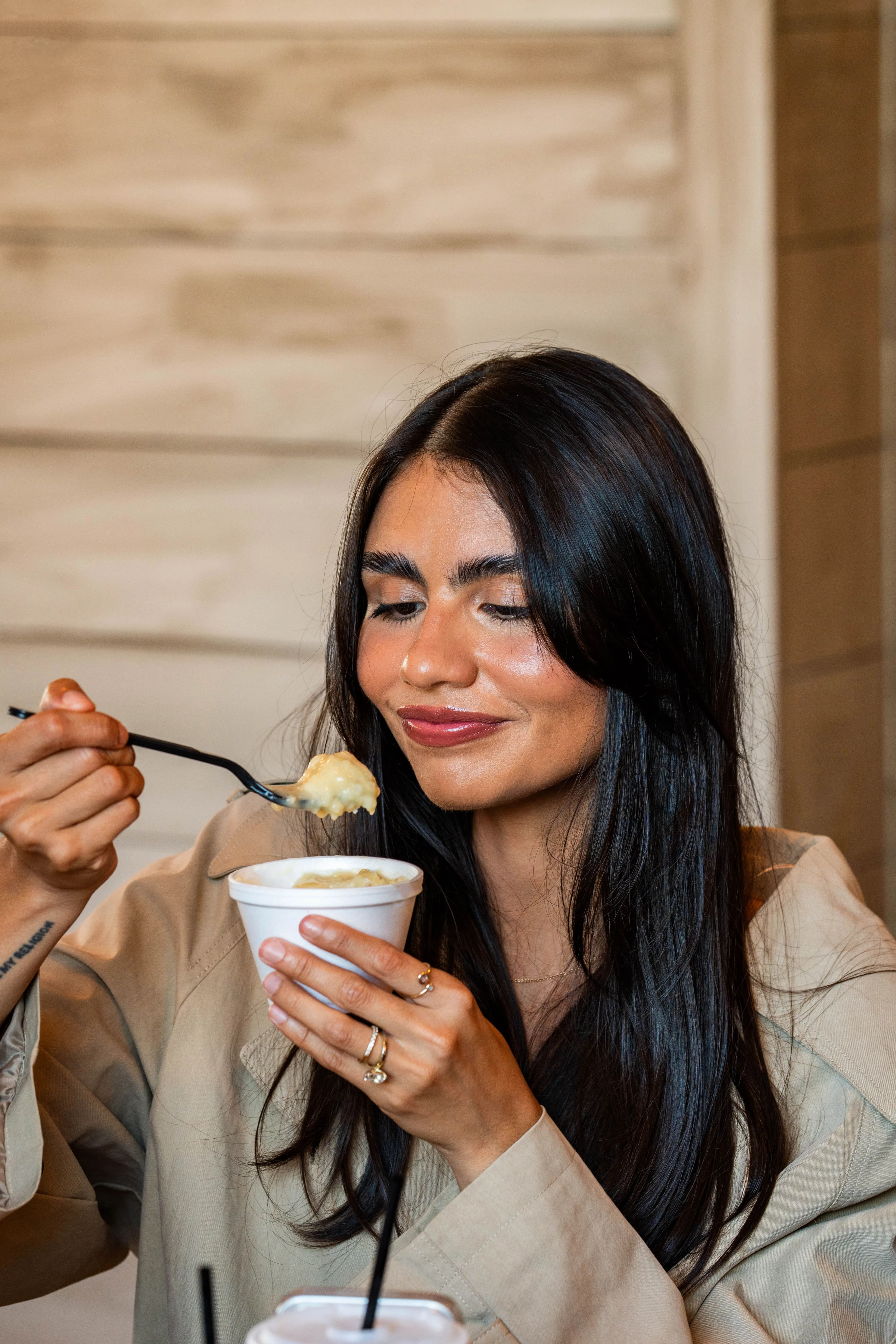 Guest tasting a side dish with a fork